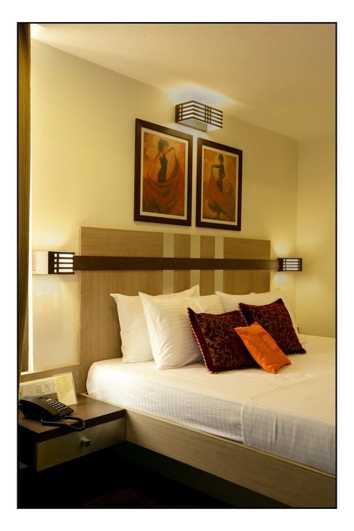 Hotel Utsav Deluxe 푸네 객실 사진