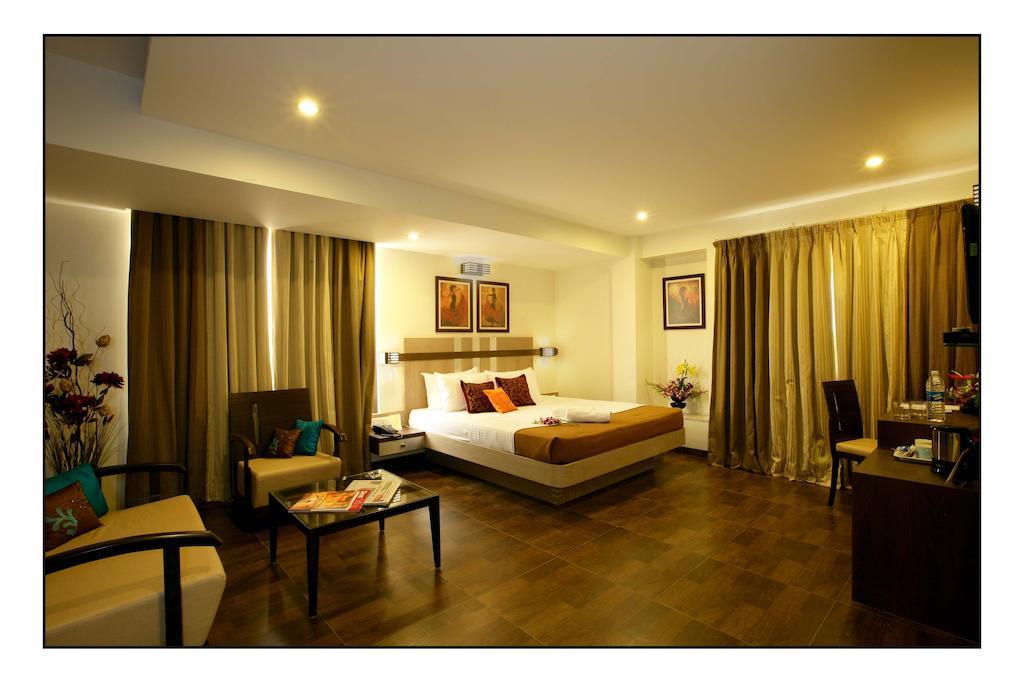 Hotel Utsav Deluxe 푸네 객실 사진