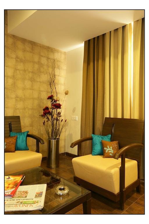 Hotel Utsav Deluxe 푸네 객실 사진